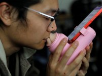 CHINA-KISSING-DEVICE_-scaled-e1679579023454[1].jpg