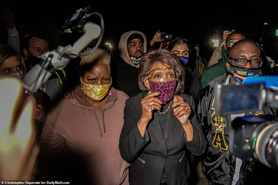 Pictured: Congresswoman Maxine Waters leaving the protest at the Brooklyn Center Police Department on Saturday