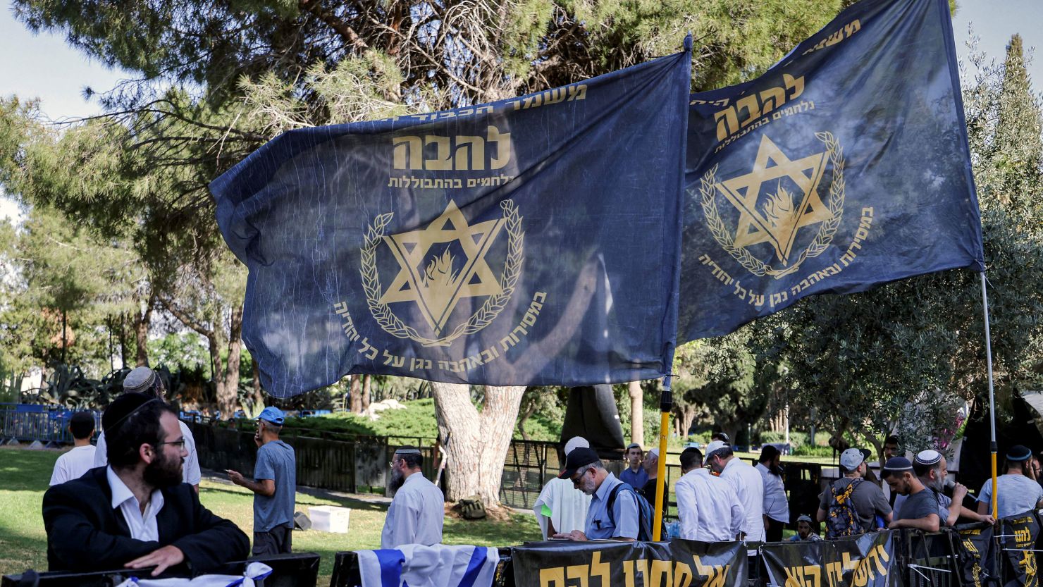 In this June 2022 photo, Israeli right-wing demonstrators gathering with the flag of the far-right Jewish group Lehava during a protest against the annual Jerusalem Pride Parade in Jerusalem.