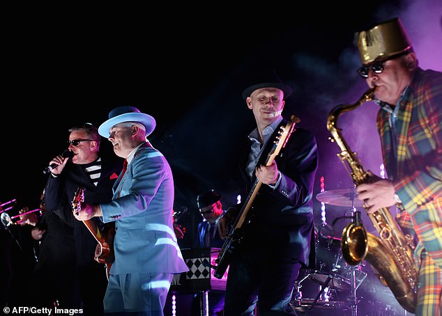 I turned on the TV and there was Suggsy bouncing around on top of Buck House with the rest of Madness (pictured)