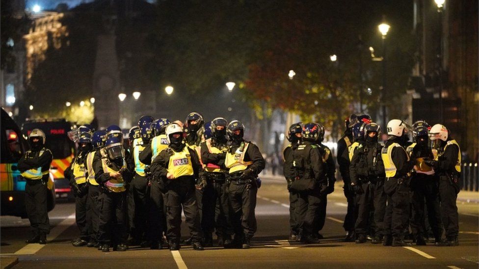 Police in protective gear