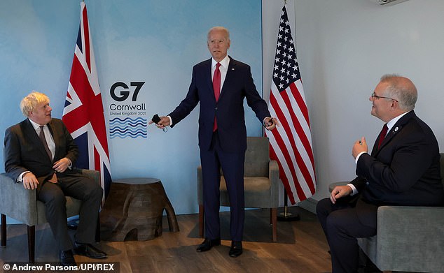 Wouldn't you just love to be a fly on the wall when Boris Johnson meets Joe Biden in America next week? Above: Mr Johnson and Mr Biden with Australian prime minister Scott Morrison at the G7 Summit in Cornwall