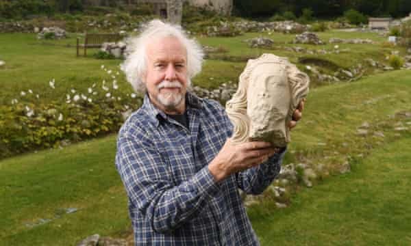 Dr Julian Richards with the head at Shaftesbury Abbey.