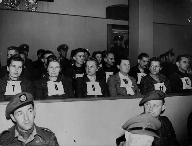 In Britain, disgust at the war crimes uncovered in Germany¿s extermination camps was feverish. Pictured: Defendants at Belsen War Crimes Trial in Luneberg, Germany (Grese is number 9)