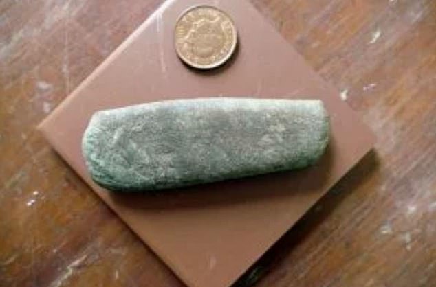 Used to skin seals, this 'bevelled pebble' discovered in a rabbit hole on Skokholm dates to the Late Mesolithic period, some 9,000 years ago. It's the first evidence of Stone Age inhabitants on the island, experts say