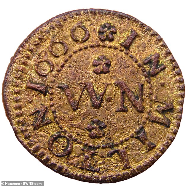 Auctioneer Mr Smith said: 'During the panic and chaos of The Great Fire of London, the Thames offered water to quell the flames and a means of escape by boat. In the panic, it's likely many of these tiny trading tokens flew out of pockets and bags'. Pictured: This token bears the name 'Milton' and the initials 'WN'