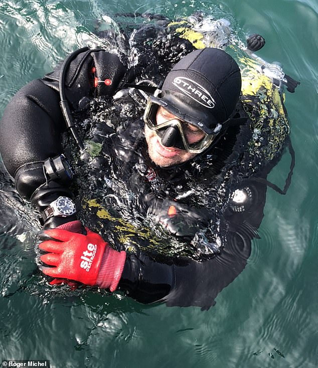 Giles Richardson is seen coming to the surface during the dive on the White Ship's wreck site