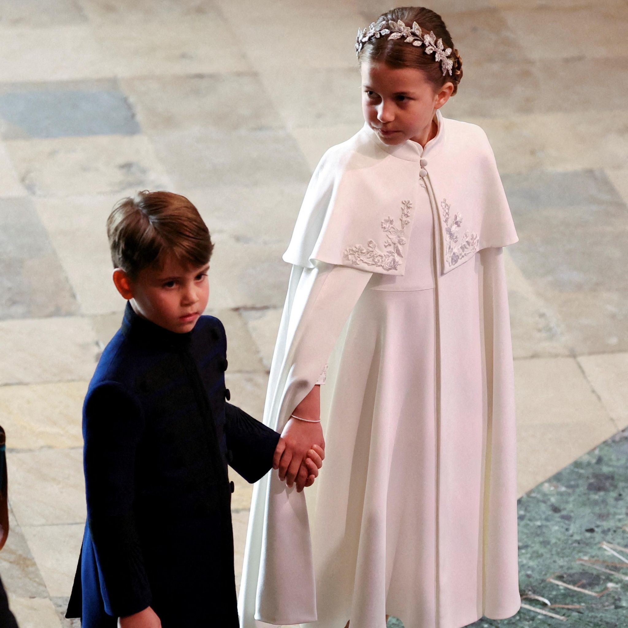 Prince Louis and Princess Charlotte hold hands at Westminster Abbey Prince Louis and Princess Charlotte hold hands at Westminster Abbey