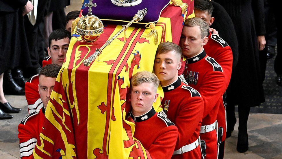 Pallbearers carrying the Queen's coffin