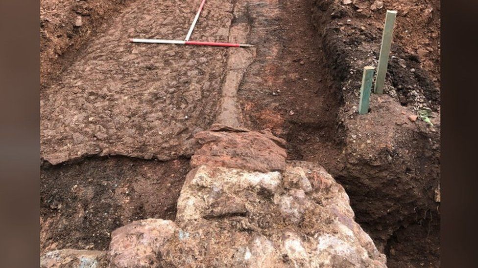 Archaeologists recording the site at Palace Gardens