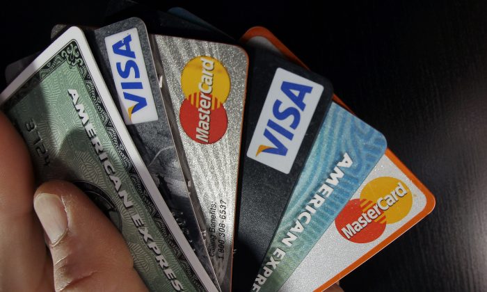 Consumer credit cards are posed in North Andover, Mass., on March 5, 2012. (Elise Amendola/AP Photo)