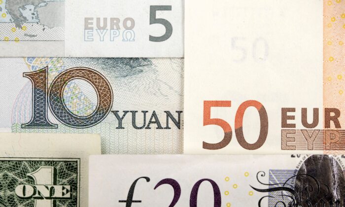 Arrangement of various world currencies including Chinese yuan, U.S. dollar, Euro, British pound, pictured on Jan. 25, 2011. (Kacper Pempel/Illustration/Reuters)